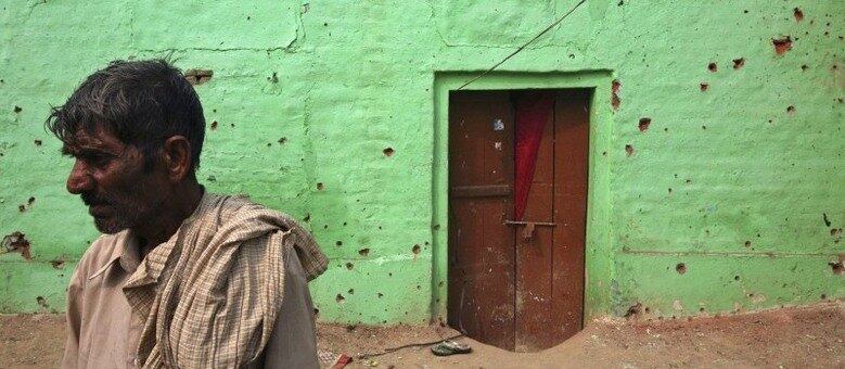 Várias casas ficaram marcadas após confrontos em Arnia
