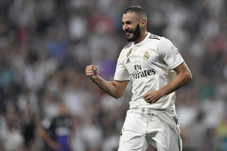 O atacante francês Benzema também fez parte do elenco do Real Madrid tetracampeão da Liga