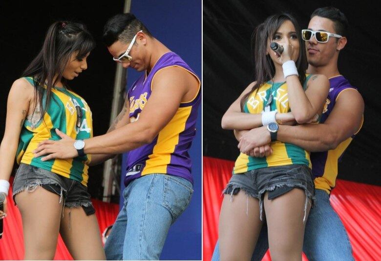 Durante o show, a cantora chamou um fã para dançar com ela e ficou bem próxima ao rapaz. Depois, reclamou que o cara estava se encostando muito...