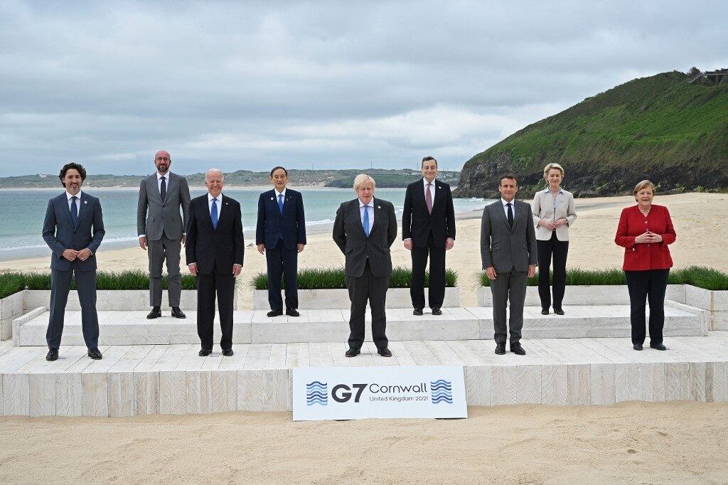 Canada's Prime Minister Justin Trudeau, President of the European Council Charles Michel, US President Joe Biden, Japan's Prime Minister Yoshihide Suga, Britain's Prime Minister Boris Johnson, Italy's Prime minister Mario Draghi, France's President Emmanuel Macron, President of the European Commission Ursula von der Leyen and Germany's Chancellor Angela Merkel pose for the family photo at the start of the G7 summit in Carbis Bay, Cornwall on June 11, 2021. G7 leaders from Canada, France, Germany, Italy, Japan, the UK and the United States meet this weekend for the first time in nearly two years, for three-day talks in Carbis Bay, Cornwall.
Leon Neal / POOL / AFP