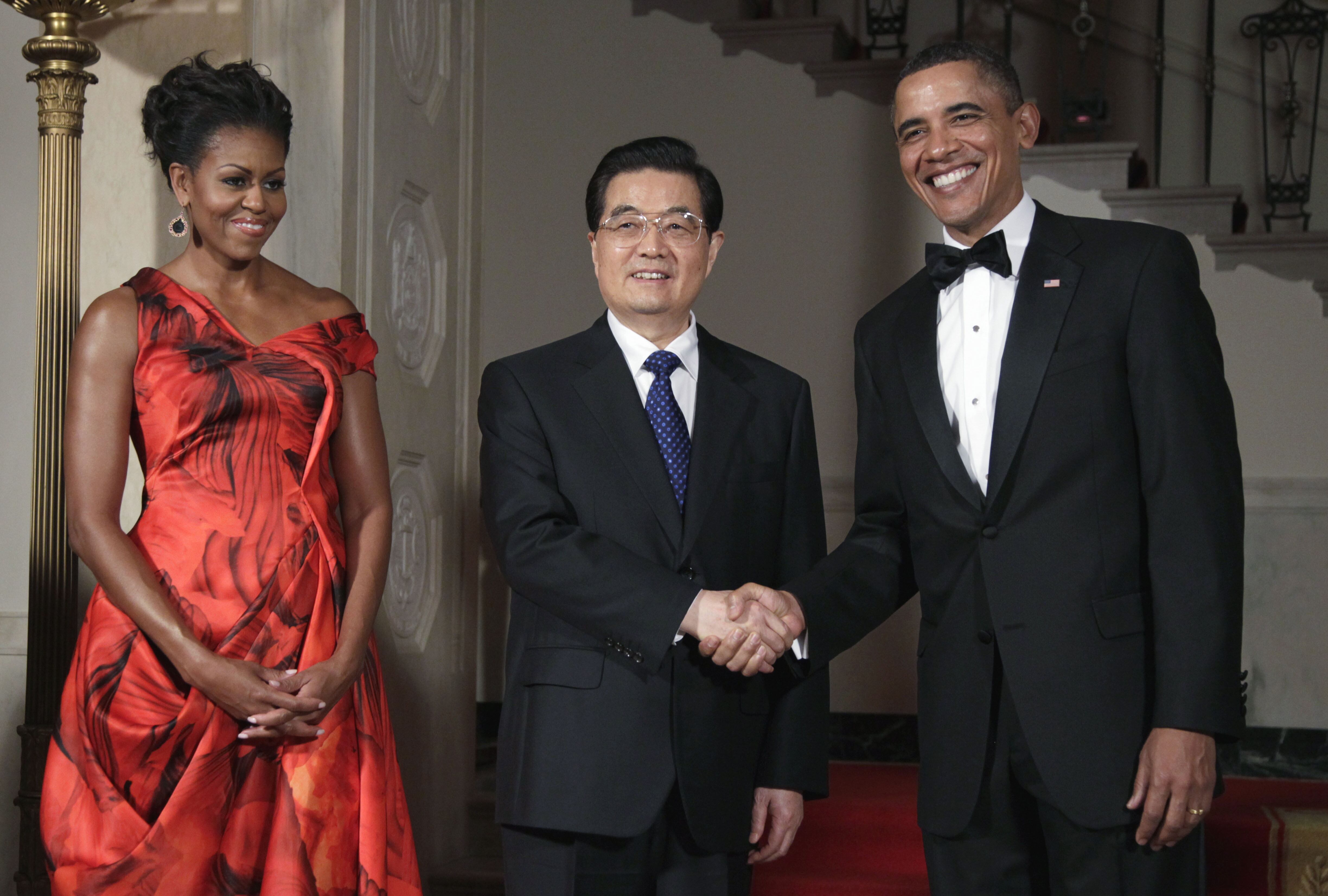 A primeira-dama dos EUA, Michelle Obama, e o líder Barack Obama receberam o ex-presidente chinês Hu Jintao em Washington, em 2011