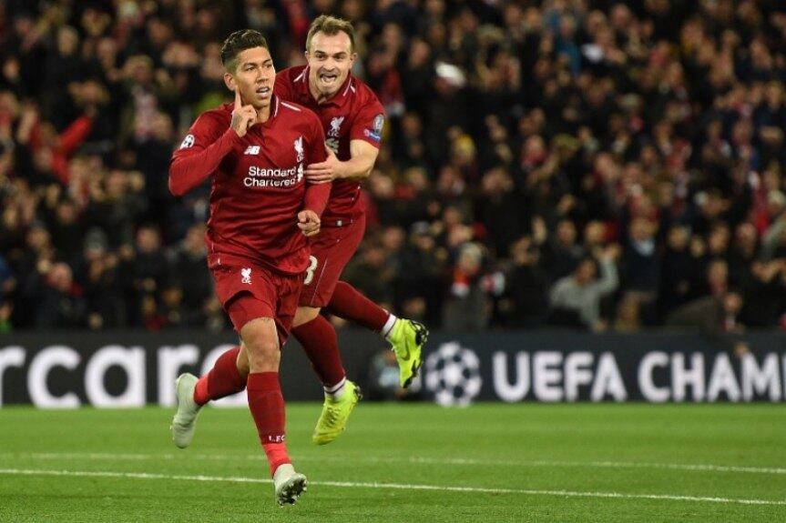 Roberto Firmino manteve a regularidade de gols com a camisa do Liverpool. Ele deixou sua marca na goleada dos Reds diante do Estrela Vermelha
(Foto: OLI SCARFF / AFP)