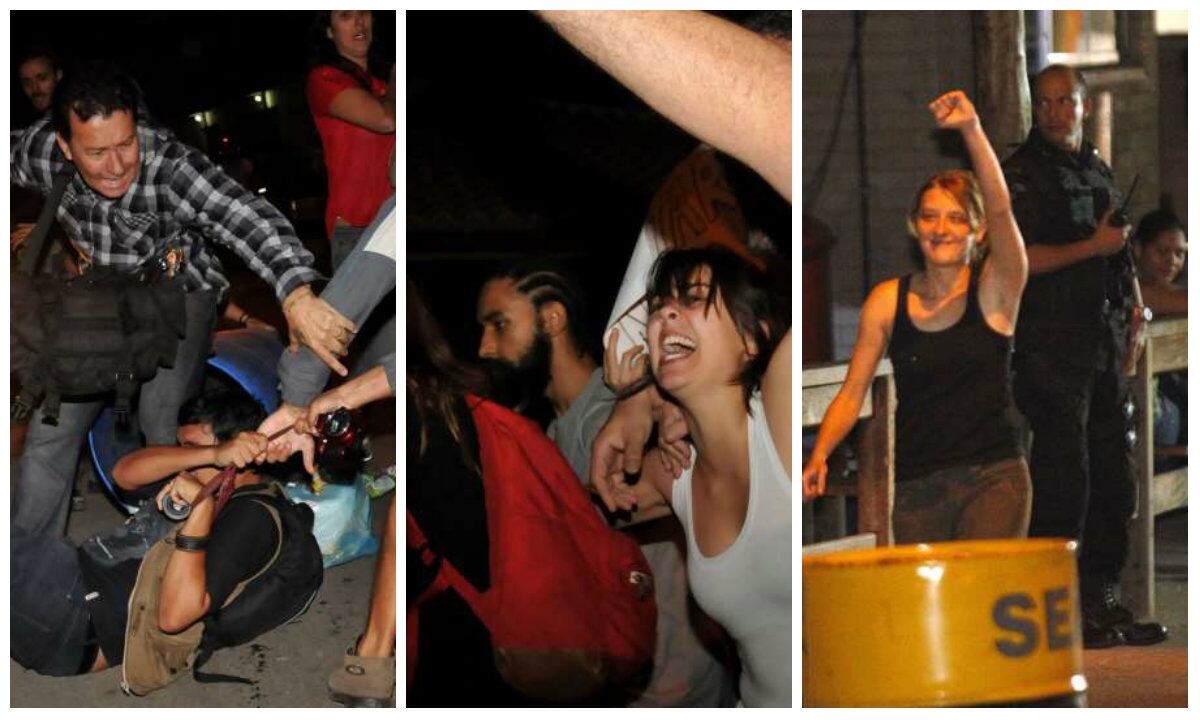Os ativistas Elisa de Quadros Pinto Sanzi, a Sininho (centro), Camila Aparecida Rodrigues Jourdan (à direita) e Igor Pereira D'licarahy, que estavam presos no Complexo de Gericinó, em Bangu, zona oeste do Rio, há 12 dias, foram soltos no começo da noite desta quinta-feira (24). Eles estavam detidos desde a véspera da final da Copa do Mundo. Manifestantes que acompanhavam a soltura impediram que fotógrafos e cinegrafistas registrassem a saída dos ativistas. Fotógrafos foram agredidos. Leia mais