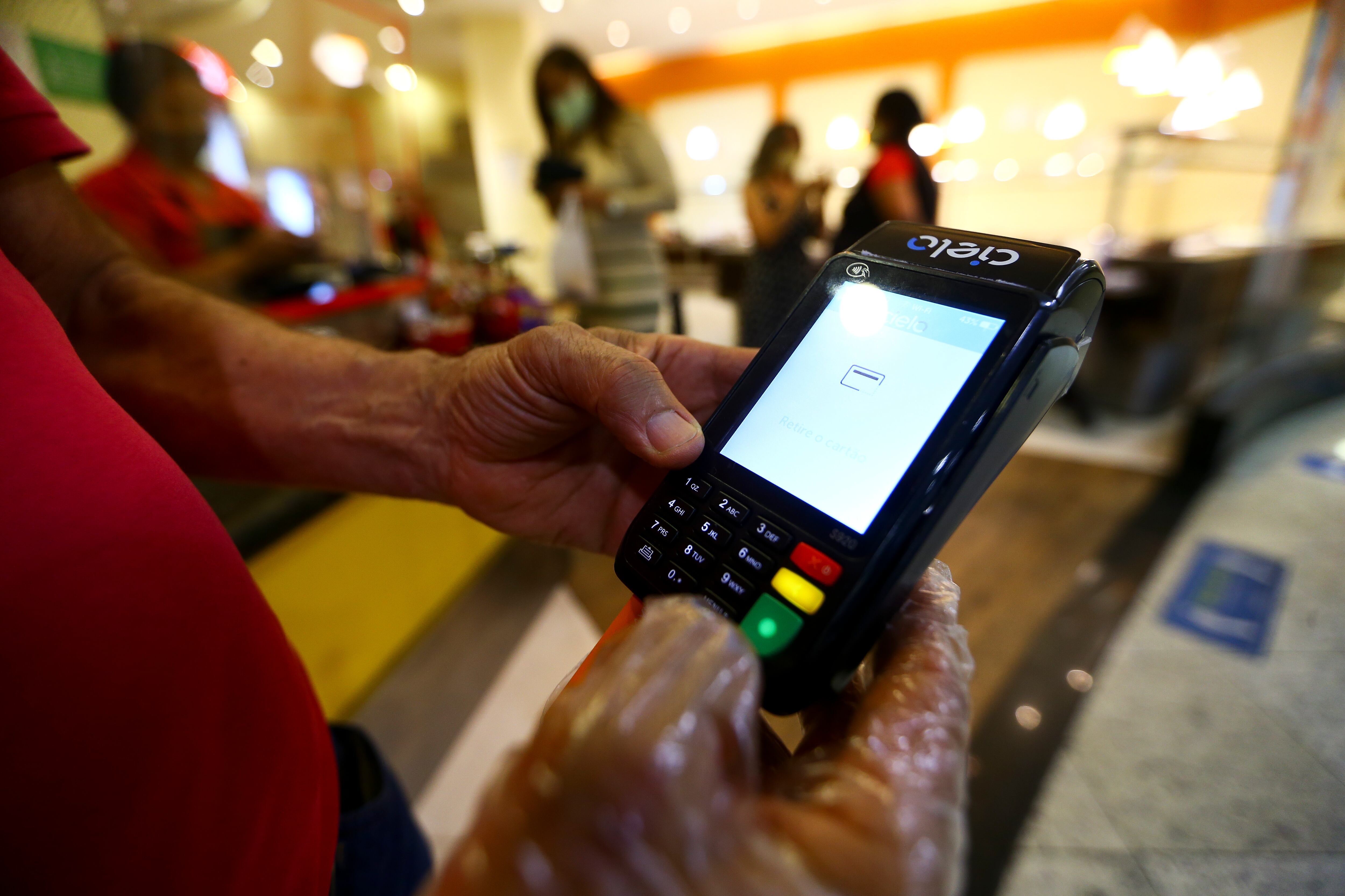 Pagamento em cartão. Maquininha