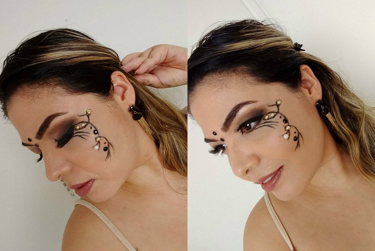 MAKE 6
- Prepare a pele com base, corretivo e pó
- Aplique  blush (dê preferência aos mais bronzeados) e iluminador
- Corrija as sobrancelhas com sombra específica para sobrancelhas ou use um lápis
- Nos olhos, marque e esfume (com movimentos de vai e vem no pincel) o côncavo afim de criar profundidade no olhar. Esfume em formato diagonal o canto externo trazendo até a metade da pálpebra. Aplique sombra clara no canto interno. Aplique delineador (traço grosso) e máscara de cílios. Em seguida aplique cílios postiços (dê preferência aos mais volumosos)
- Com o auxílio de uma caneta delineadora, puxe os arabescos (em traços finos) igual ou parecido com o da foto. Aplique pedrinhas autoadesivas (encontradas facilmente em armarinhos e loja de artesanato) em dourado, preto e pérola
- Aplique batom em cores claras e gloss incolor no centro dos lábios.
A Make está pronta!