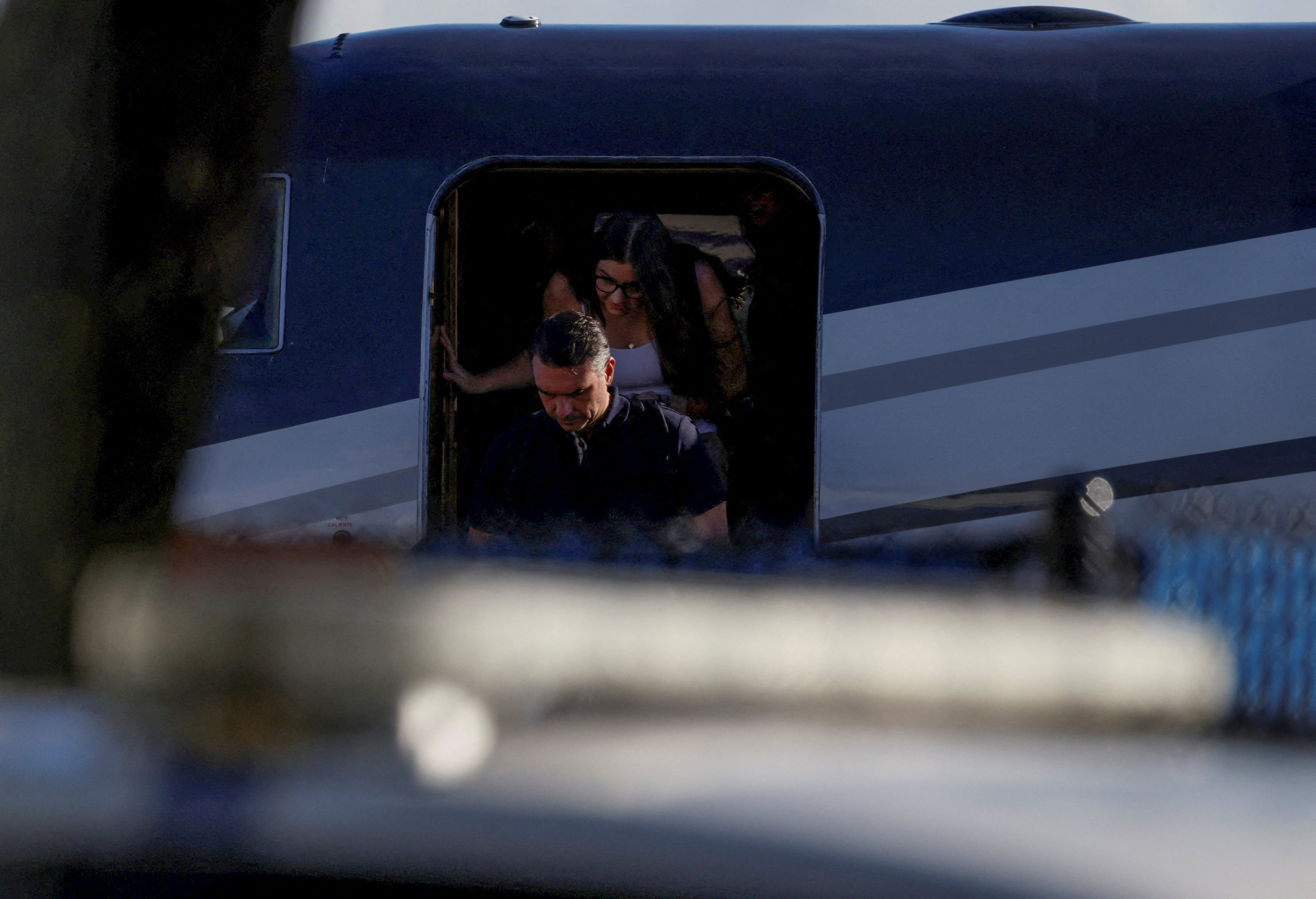 Brazilian Senator Flavio Bolsonaro disembarks from a plane after arriving at Opa-locka Executive Airport near Miami, Florida, U.S., October 28, 2026. REUTERS/Eva Marie Uzcategui REFILE - QUALITY REPEAT