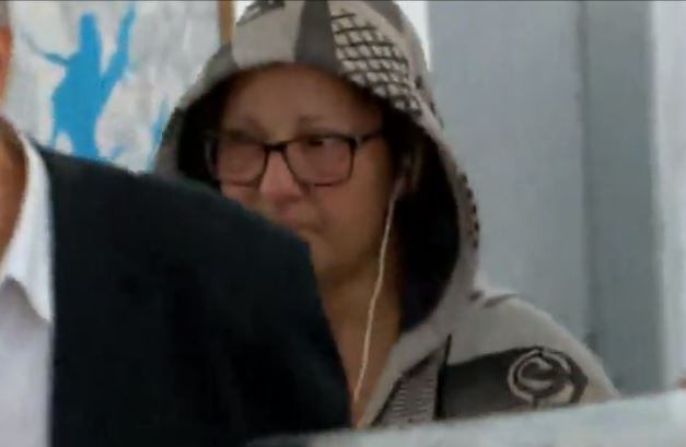 Vanessa Tibcherani ao deixar delegacia em São Paulo