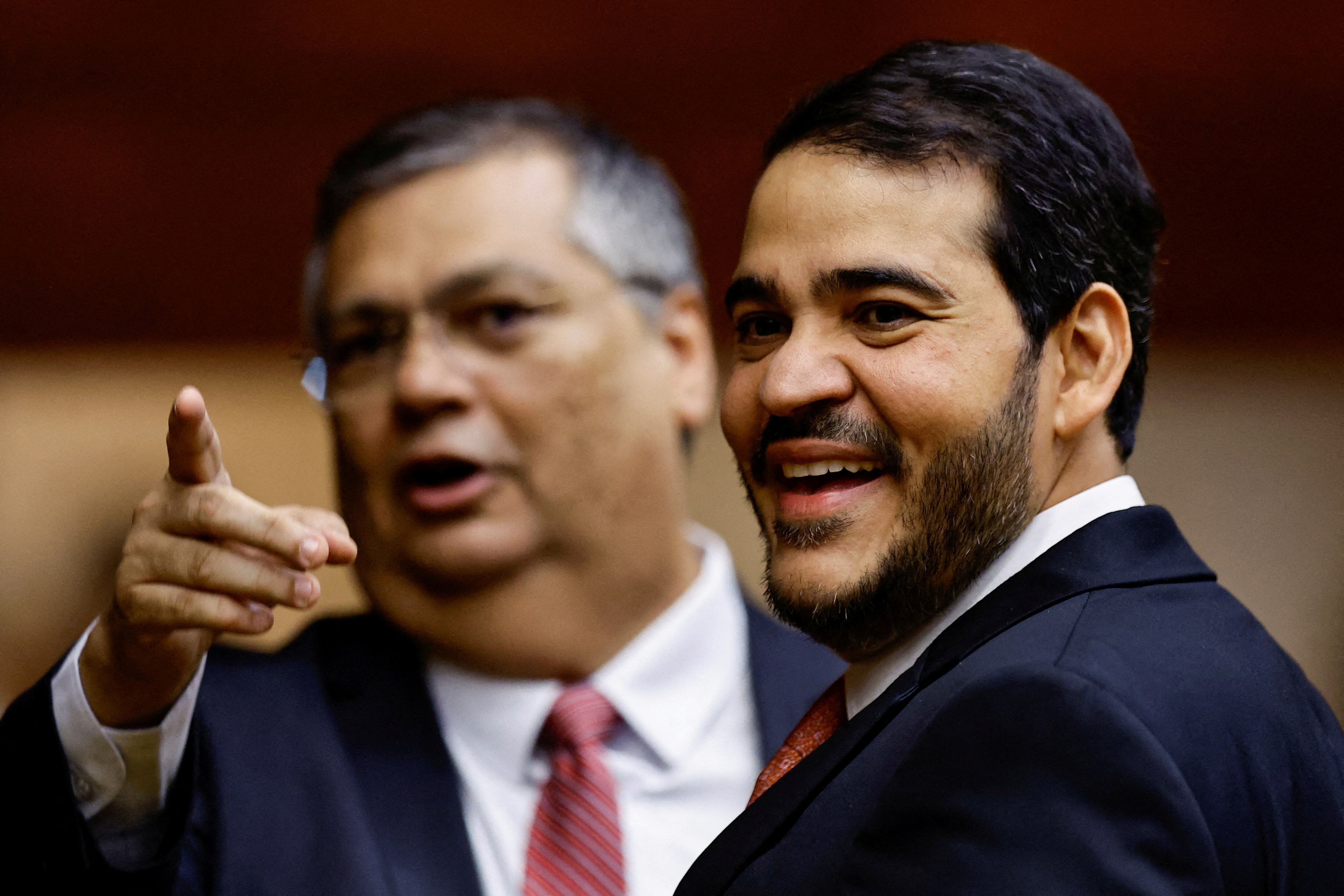 FILE PHOTO: Brazil's Minister of Justice Flavio Dino poses for a photo with Brazil's Attorney-General of the Union, Jorge Messias during an inauguration ceremony of the new President of Supreme Court, Roberto Barroso, in Brasilia, Brazil September 28, 2023. REUTERS/Ueslei Marcelino/File Photo