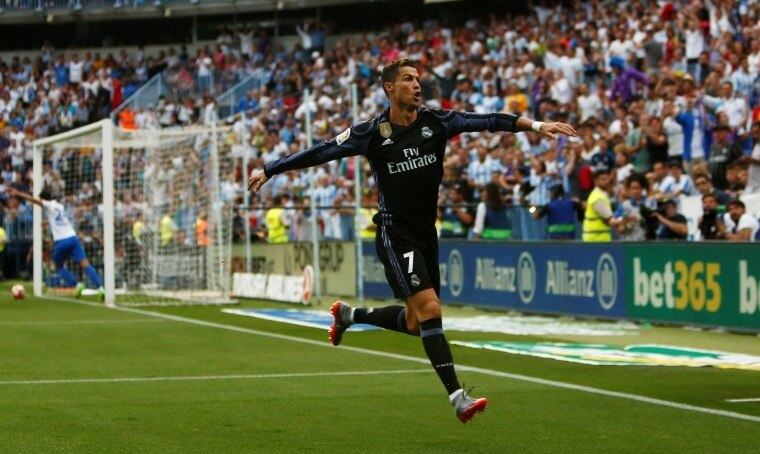 O Real Madrid conquistou seu 33º título espanhol ao vencer, fora de casa, o Málaga, por 2 a 0. Cristiano Ronaldo e Benzema foram os autores dos gols, levando o time à conquista nacional após cinco anos. Leia o relato da partida