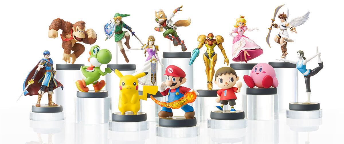 Você já ouviu falar dos bonecos Amiibo? A nova febre no mundo dos games foi lançada pela Nintendo, em quase 60 opções de personagens da Nintendo para você escolher e usar dentro dos jogos
