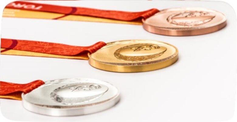 As medalhas mostram a união de todo o continente americano já que utilizou diferentes materiais para a produção