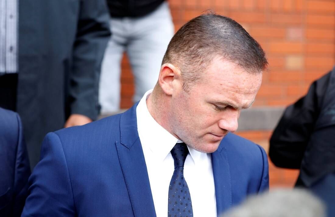 Rooney deixa o tribunal em Manchester, na Inglaterra