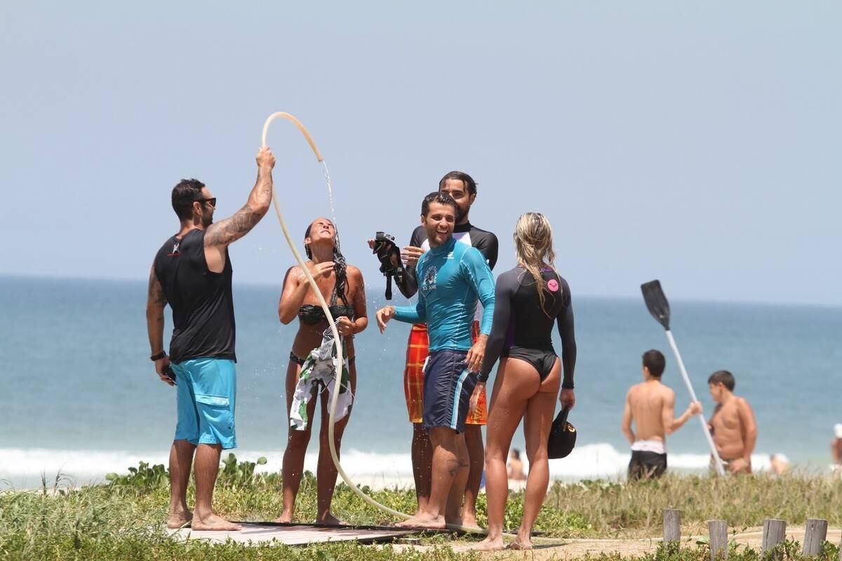 Depois do stand up paddle, água doce para tirar o sal do mar