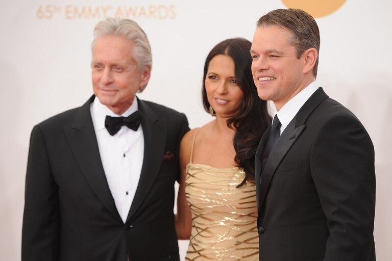 Michael Douglas com Matt Damon e sua mulher, Luciana Barroso