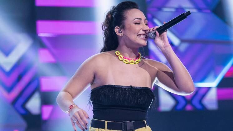 Grandes sucessos da atualidade também aqueceram o coração dos jurados! Dynamite, da banda sul-coreana BTS, foi escolhida por Ally V e a competidora conquistou, simplesmente, todos do painel