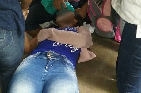 Alunos que aparecem nas imagens estão recebendo apoio