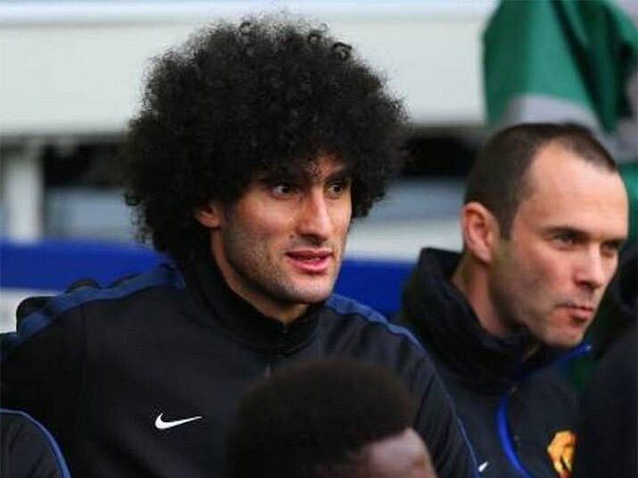 O belga Marouane Fellaini parece até que usa peruca. Mas é realmente o cabelo dele
