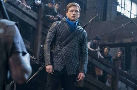 Taren Egerton é Robin Hood