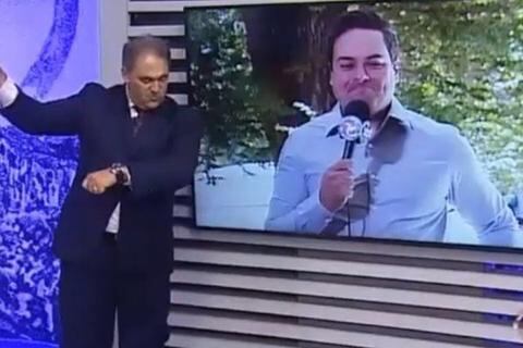 O apresentador Stanley Gusman e o repórter Rafael Martins