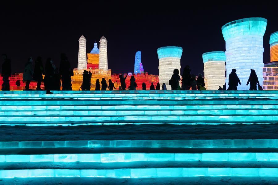 Harbin (China).- People visit the ice sculptures illuminated by turquoise colored lights at the International Ice and Snow Festival in Harbin, China, 05 January 2017 (reissued 12 May 2020). Turquoise, originally the French word for 'Turkish' referring to the country of origin of the precious blue-green colored mineral gem, is the color that fits in between green and blue and covers a wide range of 'shades' from the greenish turquoise of sea waters to the blueish turquoise of summer skies. In color psychology it is associated with creating emotional balance and stability. EFE/EPA/WU HONG ATTENTION: This Image is part of a PHOTO SET *** Local Caption ***