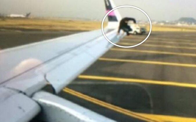 Jovem caminhou pela asa e pulou na pista de decolagem