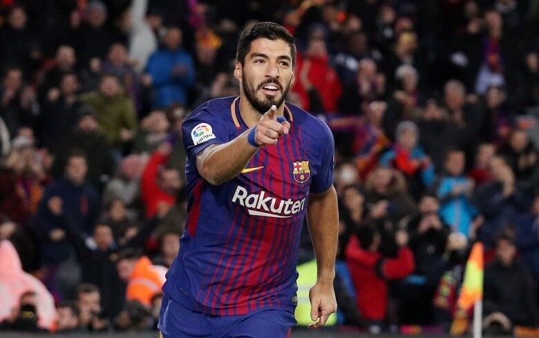 Suárez comemora gol contra o Valencia 1/2/2018 REUTERS/Albert Gea