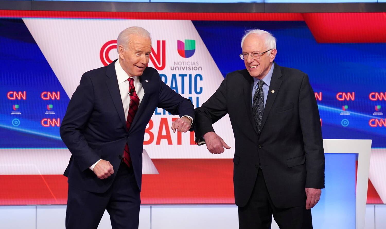 Sanders (d) anunciou apoio a Biden (e) na eleição norte-americana