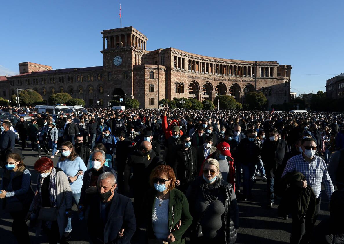 People attend an opposition rally to demand the resignation of Armenian Prime Minister Nikol Pashinyan following the signing of a deal to end the military conflict over the Nagorno-Karabakh region, in Yerevan, Armenia November 11, 2020. Vahram Baghdasaryan/Photolure via REUTERS ATTENTION EDITORS - THIS IMAGE HAS BEEN SUPPLIED BY A THIRD PARTY.