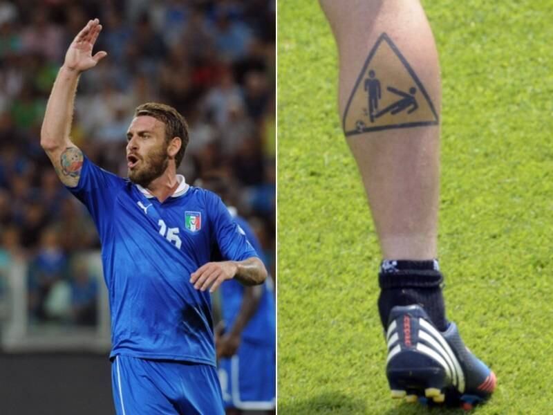 Danielle De Rossi é um grande jogador e ídolo da Roma. Além de ter muita qualidade, não falta disposição ao italiano e, ao olhar para a tatuagem do jogador, você vê que ele não dá chances ao oponente