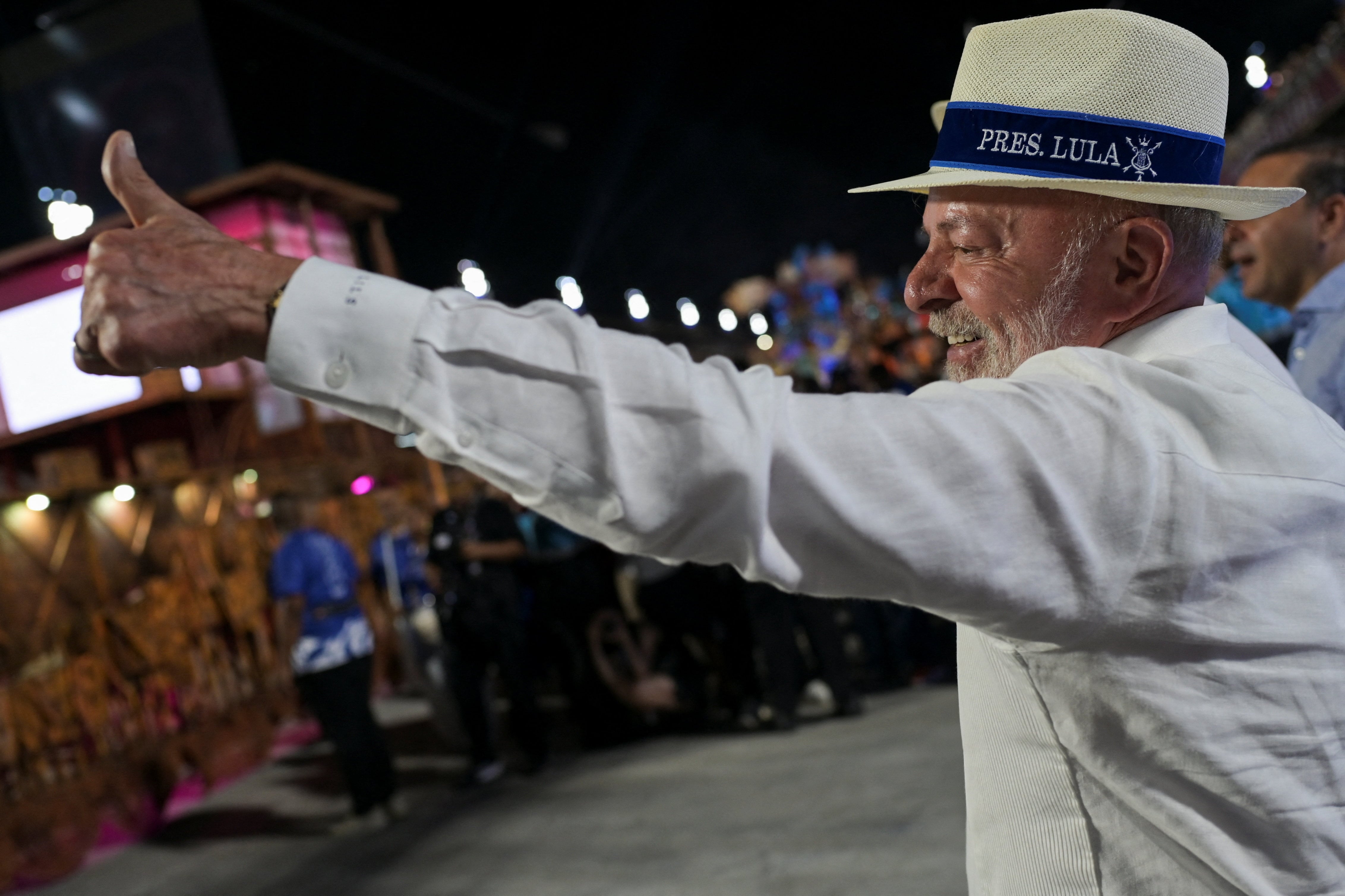 Brazil's President Luiz Inacio Lula da Silva gestures as revellers from the Academicos de Niteroi samba school perform during the Carnival in Rio de Janeiro, Brazil, February 15, 2026. REUTERS/Tita Barros