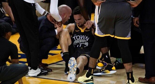 Thompson, contundido no joelho