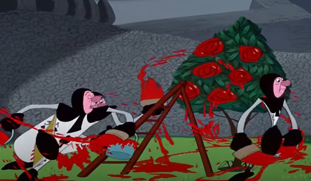 Cena importante número 12: A menina vai até o palácio da Rainha, onde a vê ordenar que três jardineiros em forma dr cartas de baralho sejam decapitados porque plantaram rosas brancas ao invés de vermelhas e tentaram enganar a rainha pintando as flores.