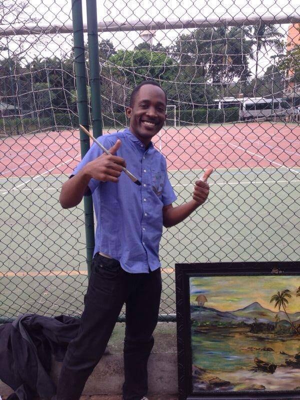 Dady Simon, de 30 anos, é um haitiano que torceu e dançou muito durante a festa. Mas, ele fez questão de mostrar que é um artista. Com um pincel na mão, Dady retocou alguns quadros que trouxe de metrô para expor durante a competição