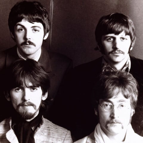 Pergunta número 2: Diante de toda a história do grupo, quantas músicas e álbuns eles fizeram?