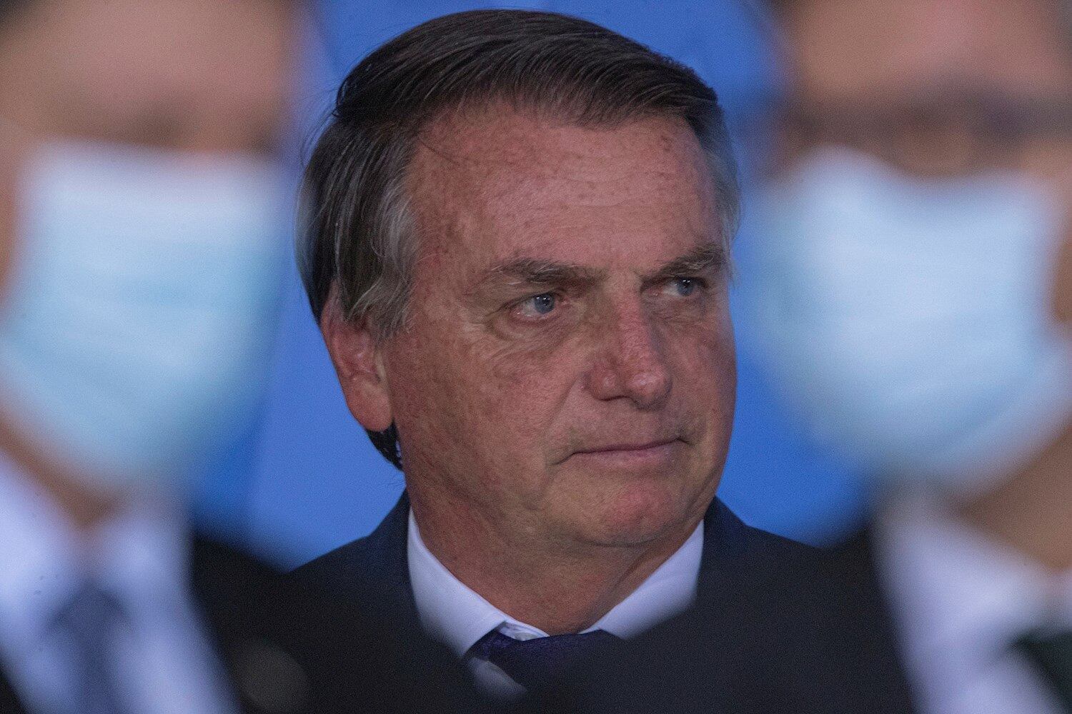 BRA113. BRASILIA (BRASIL), 02/09/2021. - El presidente de Brasil, Jair Bolsonaro, participa en la ceremonia de lanzamiento de Autorizaciones Ferroviarias, este jueves en el Palacio do Planalto, en la ciudad de Brasilia. EFE/ Joedson Alves